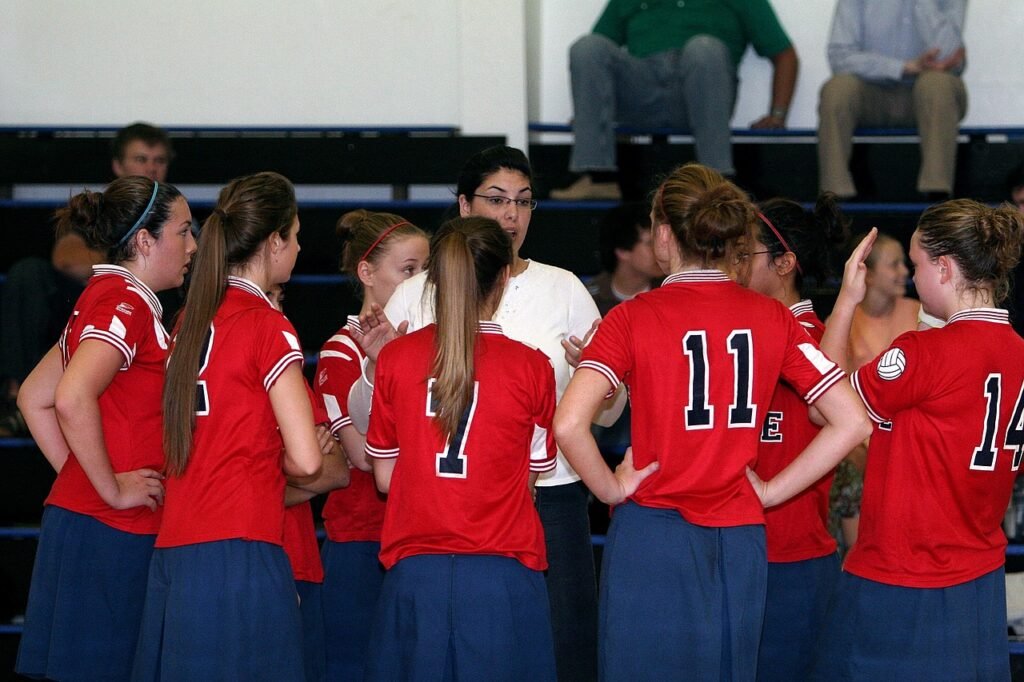 volleyball team, coach, game, sport, team, volleyball, competition, people, school, teenager, young, involvement, mentor, pep talk, coaching, red, gym, gymnasium, communicate, encourage, leader, leadership, motivate, coach, coach, coach, coach, coach, volleyball, volleyball, mentor, coaching, coaching, leader, leadership, leadership